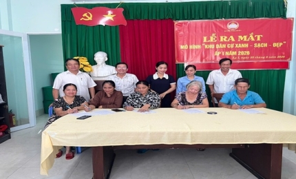 Quang cảnh: Các hộ dân cam kết thực hiện